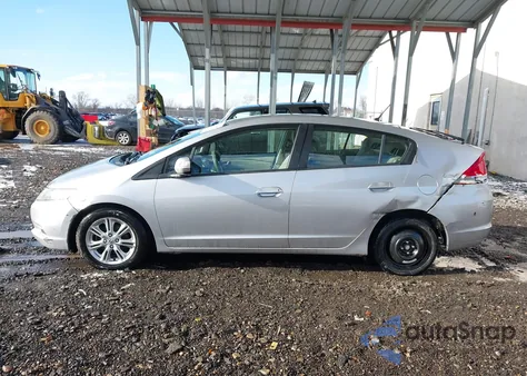 2010 Honda Insight Ex z USA, uszkodzony, nr VIN JHMZE2H78AS009393